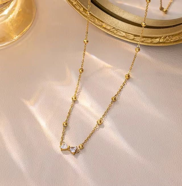 Zarqoon Bow Necklace