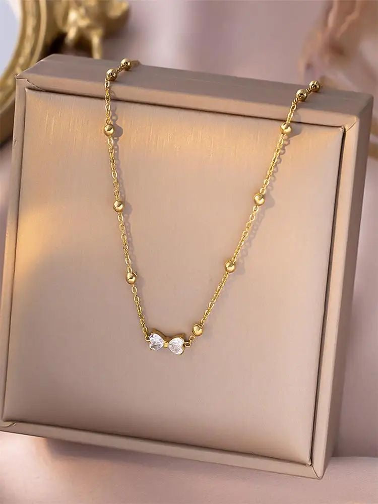 Zarqoon Bow Necklace